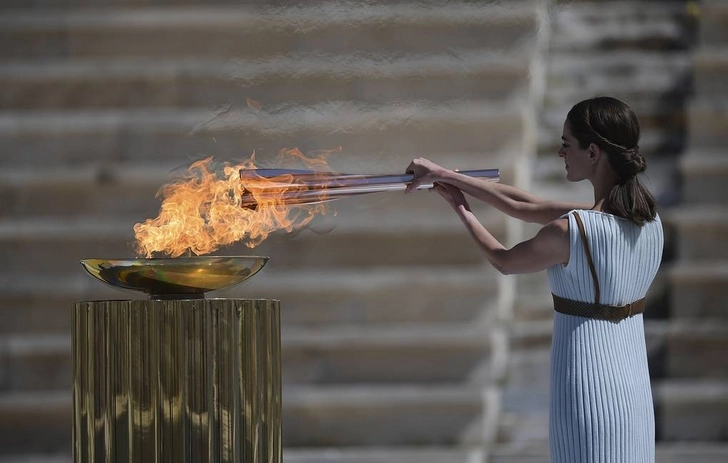 Олимпийский огонь во время эстафеты в Японии планируют возить на автомобиле