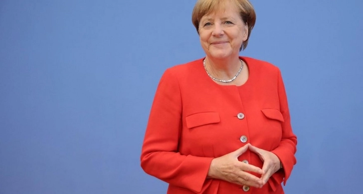 Партия Меркель лидирует на региональных выборах в Германии