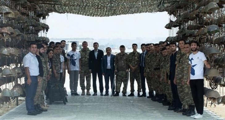 Проживающие в Губе и Хачмазе ветераны посетили Парк военных трофеев в Баку