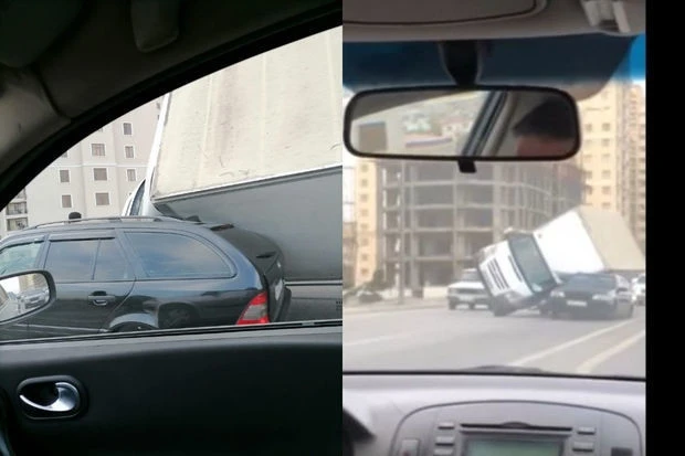 В Баку сильный ветер опрокинул грузовик на легковой автомобиль - ФОТО/ВИДЕО