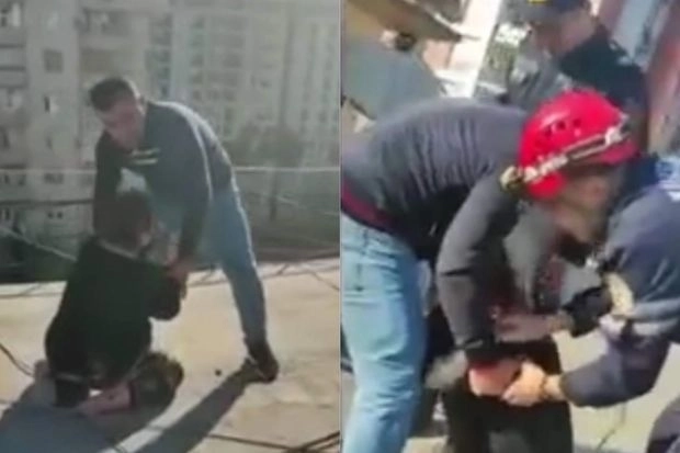 Попытка суицида в Баку: женщина хотела спрыгнуть с крыши здания - ВИДЕО