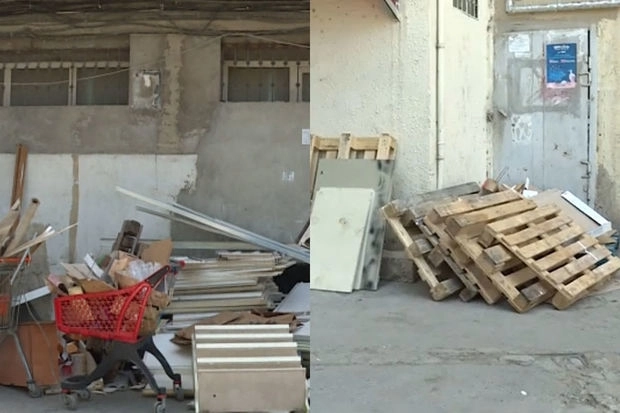 В Баку двор жилого дома превратили в мусорный полигон - ВИДЕО