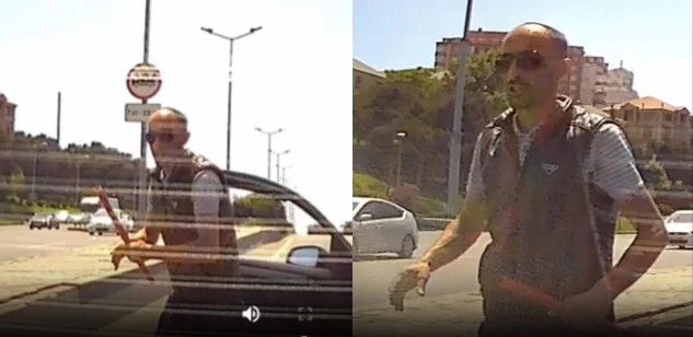 В Баку таксист преградил дорогу женщине-водителю и стал угрожать ей дубинкой