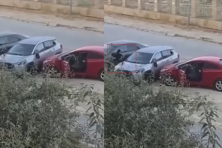 В Баку женщина намеренно въехала в припаркованный автомобиль и пыталась разбить его стекла