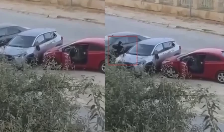 В Баку женщина намеренно въехала в припаркованный автомобиль и пыталась разбить его стекла