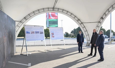 Президент Ильхам Алиев ознакомился с техникой для перевозки бытовых отходов в Баку